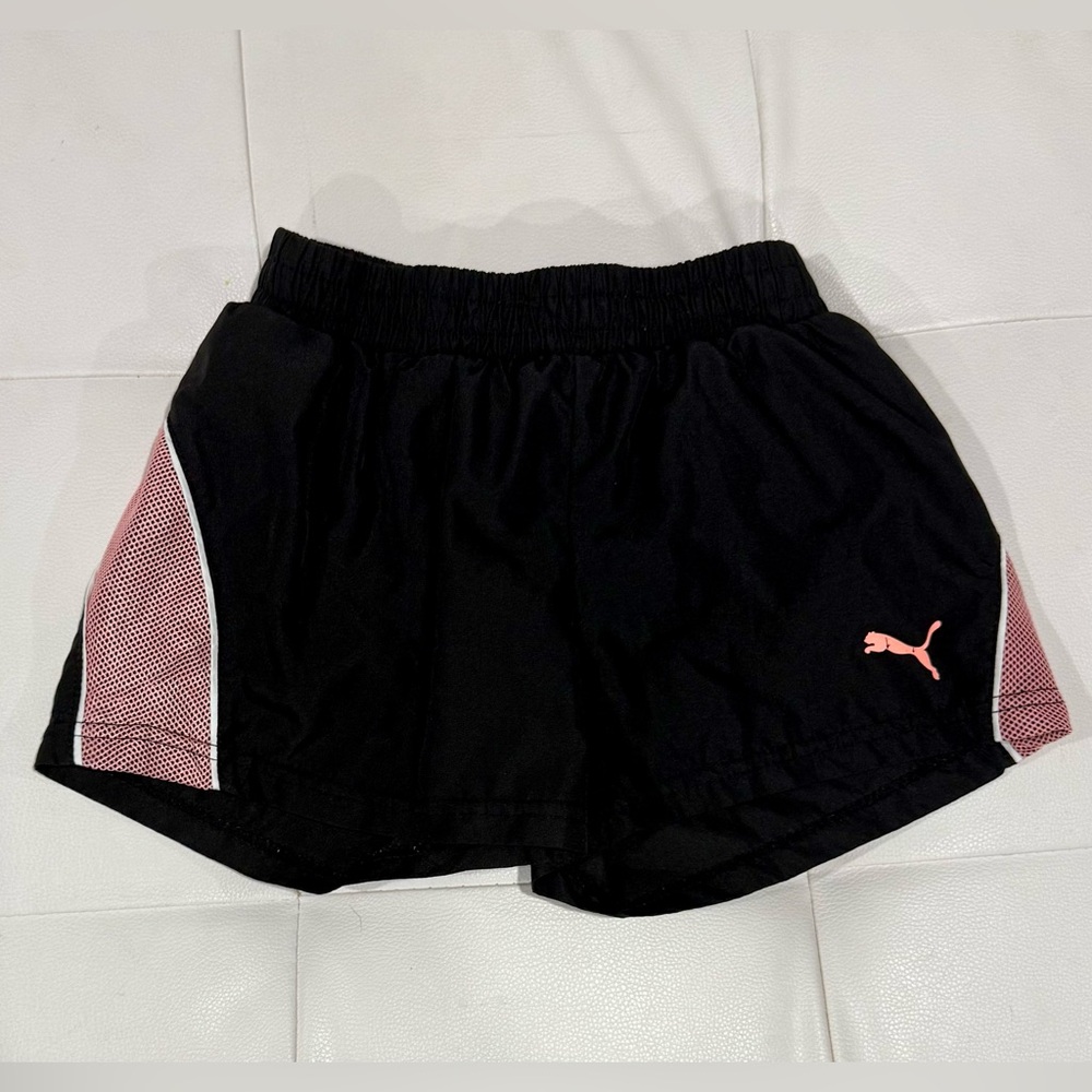 Girls puma breathable shorts. Excellent condition. Interior mesh short sewn in.